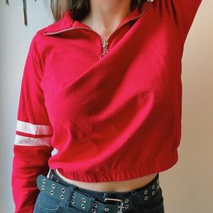 Tilly’s red cinched half zip